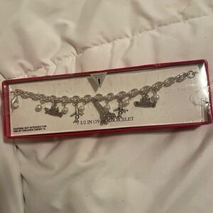 Eiffel Tower, airplane and boat charm bracelet.